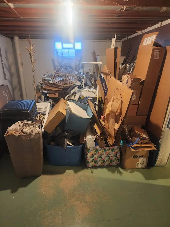 Roll-off dumpster container at job site for 2 Yard Dumpster Rental in Dobbs Ferry